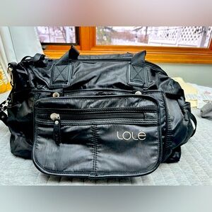 Lole gym/travel bag. Loaded with pockets and strap options, hardly used